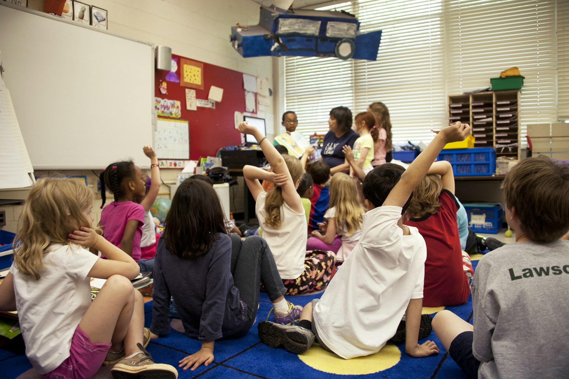 Students in a classroom supported by education program